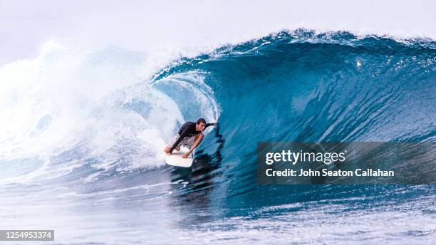 indonesia, surfing in the batu islands - surfing island ストックフォトと画像