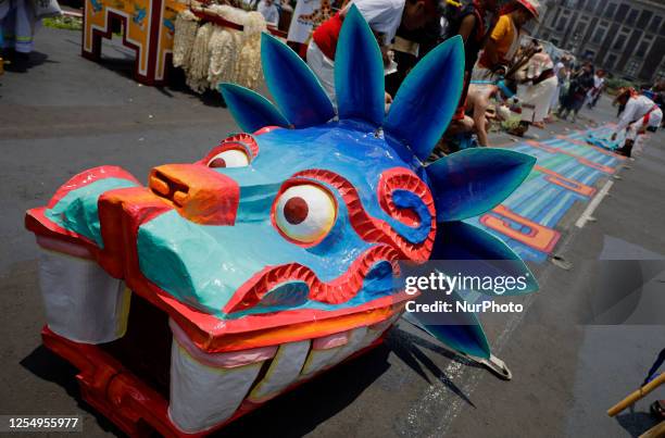 Representation of the Mexica god Quetzalcoatl , during a procession on the occasion of the Toxcatl Ceremony in the Zocalo of Mexico City, which...