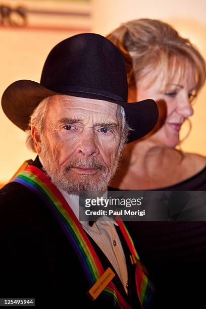 Honoree Merle Haggard and Theresa Ann Lane arrive at the 33rd Annual Kennedy Center Honors at the Kennedy Center Hall of States on December 5, 2010...