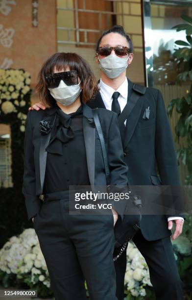 Josie Ho, daughter of Macao business magnate Stanley Ho, and her husband Conroy Chan attend the funeral of Stanley Ho on July 8, 2020 in Hong Kong,...