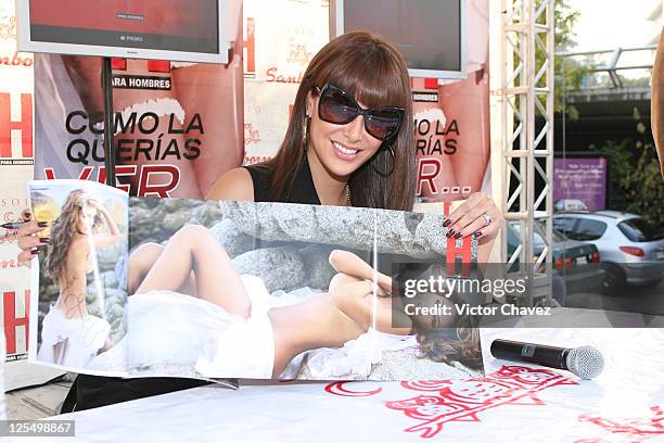 Singer Ninel Conde signs copies of her cover of "H Para Hombres" magazine at Plaza Cuicuilco on November 16, 2010 in Mexico City, Mexico.