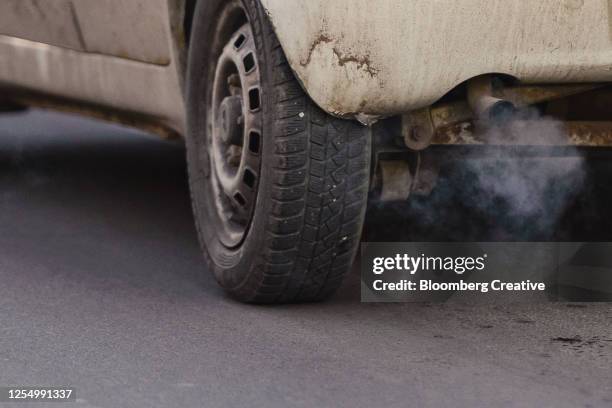 car exhaust pollution - car fumes stock-fotos und bilder