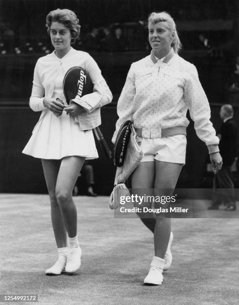 Sandra Reynolds of South Africa and Ann Haydon-Jones of Great Britain walk onto centre court before their Women's Singles Semi-Final match at the...