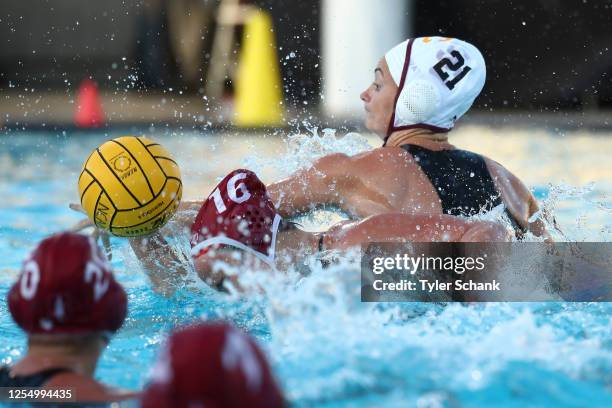 Jenna Flynn of the Stanford Cardinal and Honnie Vandeweghe-O'Shea of USC Trojans battle for the ball during the Division I Women's Water Polo...