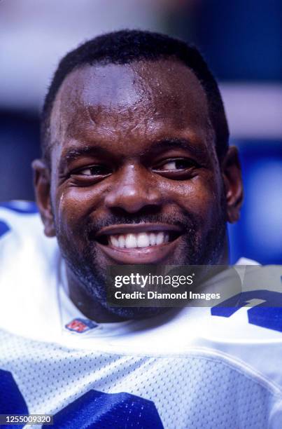 Running back Emmitt Smith of the Dallas Cowboys on the sideline during a game against the Phoenix Cardinals on November 14, 1993 at Texas Stadium in...