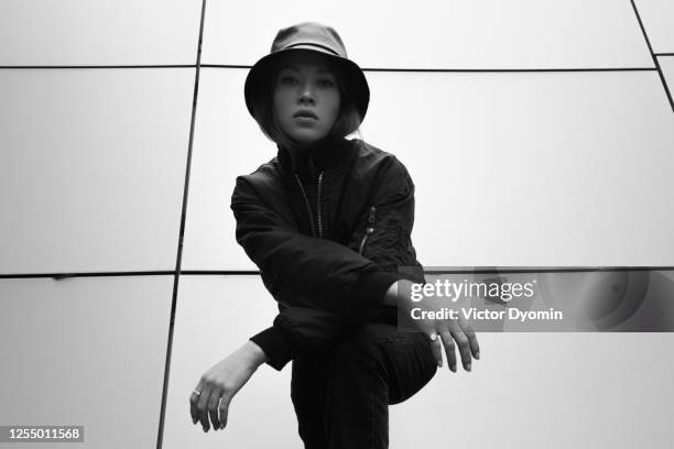 black and white outdoor portrait of the stylish girl - white rapper stock pictures, royalty-free photos & images