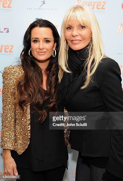 Kyle Richards and Nanette Francini arrive to the fitperez.com holiday health bash on December 7, 2010 in Los Angeles, California.