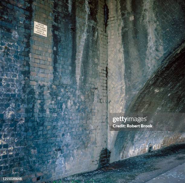 tow path entering tunnel on canalised section of river lea, stratford, east london - the valley london stock pictures, royalty-free photos & images