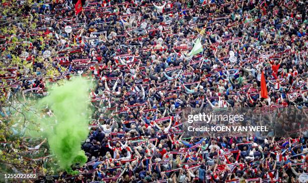 Feyenoord football fans gather on the Coolsingel to celebrate the club winning the Dutch 'Eredivisie' football league in Rotterdam on May 15, 2023....