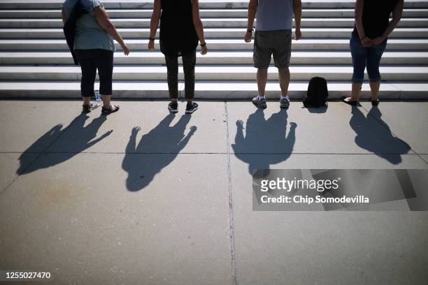 Anti-abortion demonstrators pray in front of the U.S. Supreme Court July 08, 2020 in Washington, DC. In a dual victory for religious groups, the...