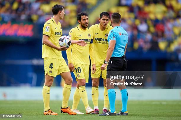 Dani Parejo , Pau Torres and Mandi of Villarreal CF talk with referee Carlos del Cerro Grande during the LaLiga Santander match between Villarreal CF...