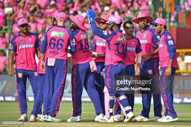 Rajasthan Royals players celebrate a wicket during the IPL 2023 cricket match between Rajasthan Royals and Royal Challengers Bangalore, at Sawai...