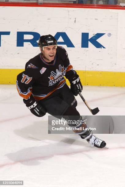 Adam Oates of the Washington Capitals looks on during a NHL hockey game against the Boston Bruins at MCI Center on January 14, 2002 in Washington, DC.