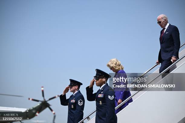 President Joe Biden and US First Lady Jill Biden disembark Air Force One at Joint Base Andrews in Maryland on May 15 as they return from travel to...