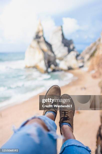 young woman against sea at ursa beach, portugal - legs in stockings stock pictures, royalty-free photos & images