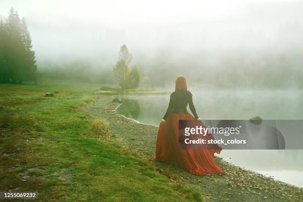 walking around this fairytale-like lake - the fairy queen stock pictures, royalty-free photos & images