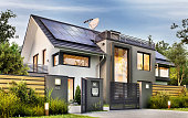 Modern house with garden and solar panels