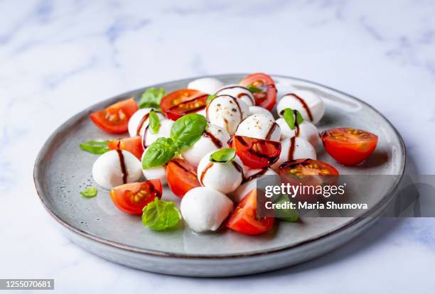 delicious italian salad - caprese salad balsamic stock pictures, royalty-free photos & images