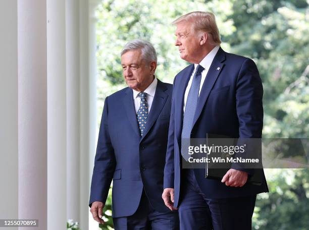 President Donald Trump walks to the Rose Garden with Mexican President Andrés Manuel López Obrador at the White House July 8, 2020 in Washington, DC....