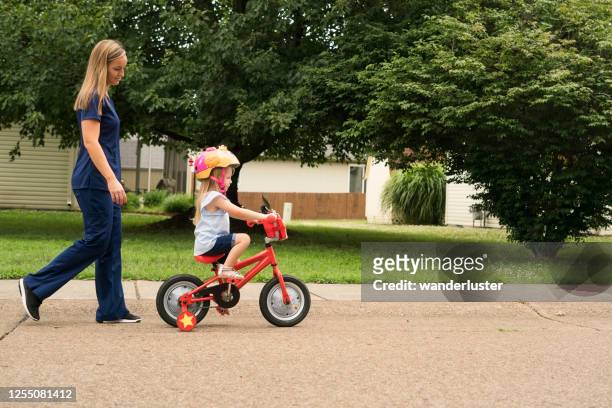 learning how to ride a bike - indiana home stock pictures, royalty-free photos & images