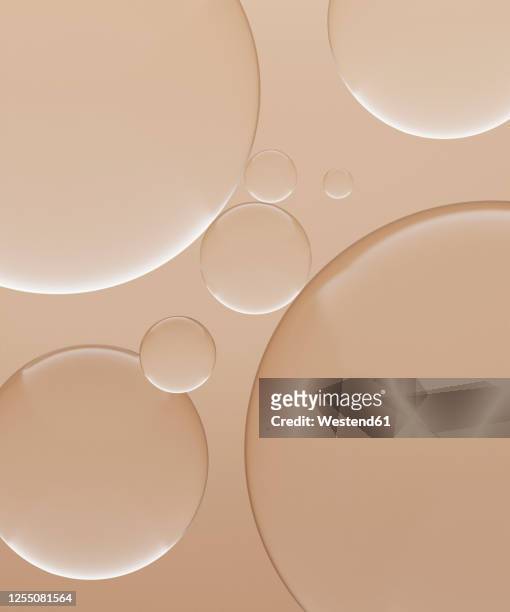 stockillustraties, clipart, cartoons en iconen met three dimensional render of transparent glass spheres against light brown background - bel vloeistof
