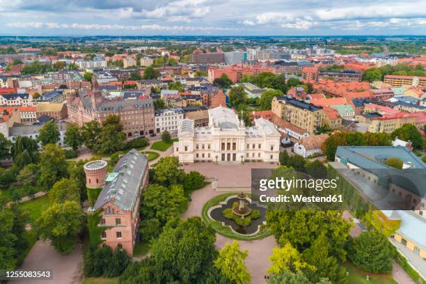 sweden, scania, lund, aerial view of lund university and surrounding old town buildings - lund stockfoto's en -beelden