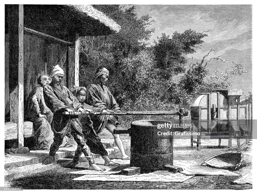Farmers working milling rice Japan 1876