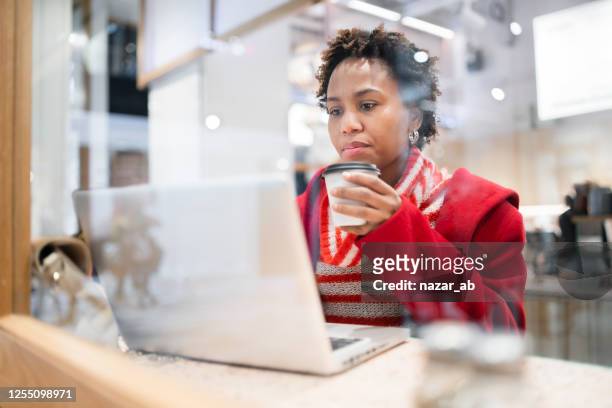 woman on laptop working. - fiji stock pictures, royalty-free photos & images