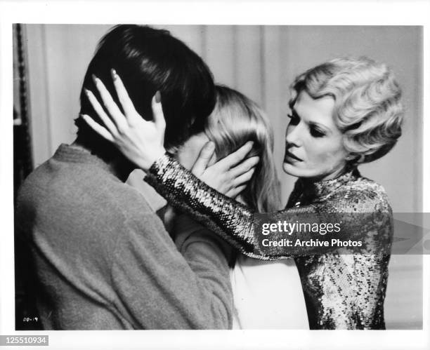 John Karlen is forced to kiss Daniele Ouimet in a scene from the film 'Daughters Of Darkness', 1971.