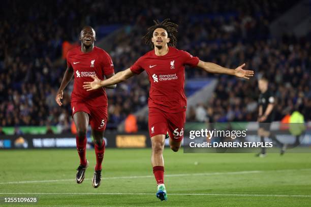 Liverpool's English defender Trent Alexander-Arnold celebrates after scoring his team third goal during the English Premier League football match...