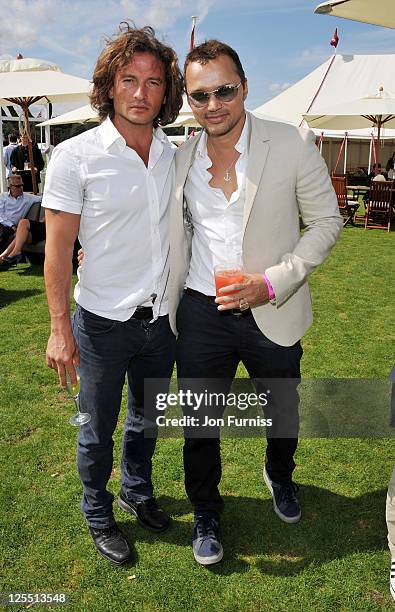 Manuele Malenotti and Gerry Devoe attends the Cartier International Polo Day 2011 at Guards Polo Club in Windsor Great Park on July 24, 2011 in...