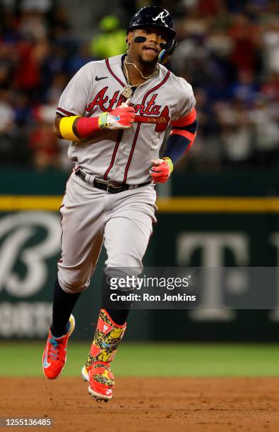 Ronald Acuna Jr. #13 of the Atlanta Braves rounds the bases after hitting a two run home run against the Texas Rangers during the second inning at...