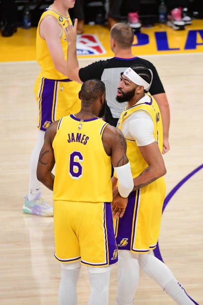 LeBron James and Anthony Davis of the Los Angeles Lakers talk during Game Six of the Western Conference Semi-Finals of the 2023 NBA Playoffs against...