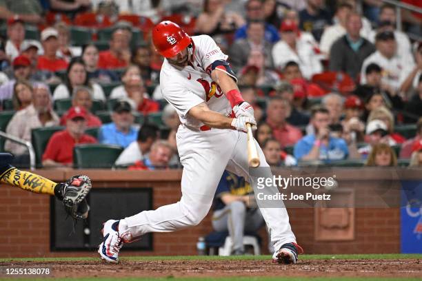 Paul Goldschmidt of the St. Louis Cardinals hits an RBI single against the Milwaukee Brewers in the sixth inning at Busch Stadium on May 15, 2023 in...