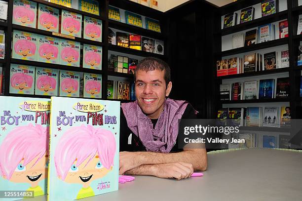 Perez Hilton signs copies of his book "The Boy With The Pink Hair" at Books and Books on September 17, 2011 in Miami Beach, Florida.
