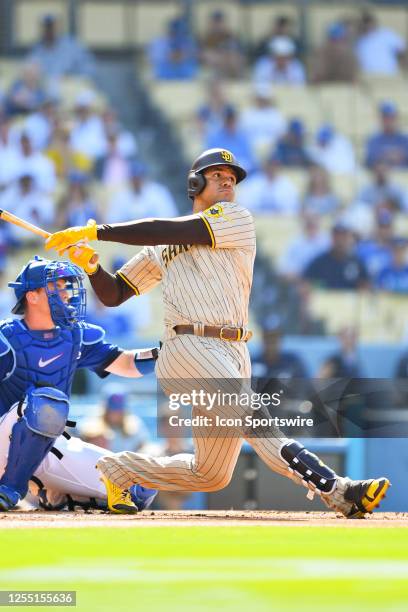 San Diego Padres left fielder Juan Soto hits a home run during the MLB game between the San Diego Padres and the Los Angeles Dodgers on May 13, 2023...