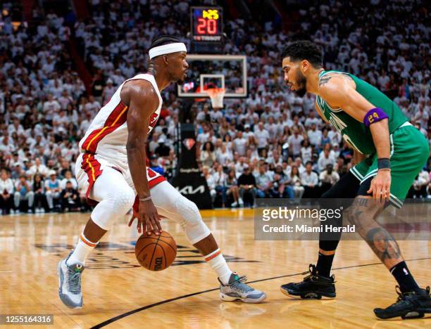 Miami Heat forward Jimmy Butler drives against Boston Celtics forward Jayson Tatum during the third quarter of Game Seven of the NBA Eastern...