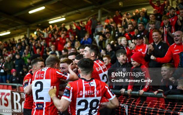 Derry , United Kingdom - 15 May 2023; Brandon Kavanagh of Derry City celebrates with teammates after scoring their side's second goal during the SSE...