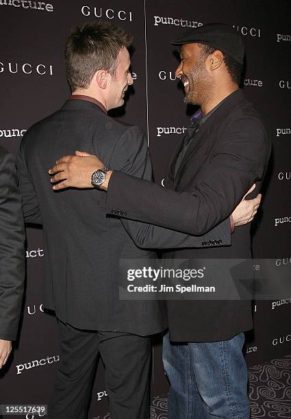 Actors Chris Evans and Jesse L. Martin attend the "Puncture" premiere at the Angelika Film Center on September 15, 2011 in New York City.