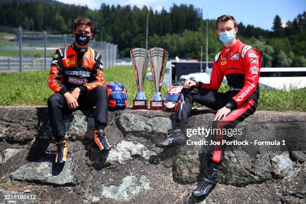 Winner of the round 1 feature race Callum Ilott of Great Britain and UNI-Virtuosi Racing and winner of the round 1 sprint race Felipe Drugovich of...