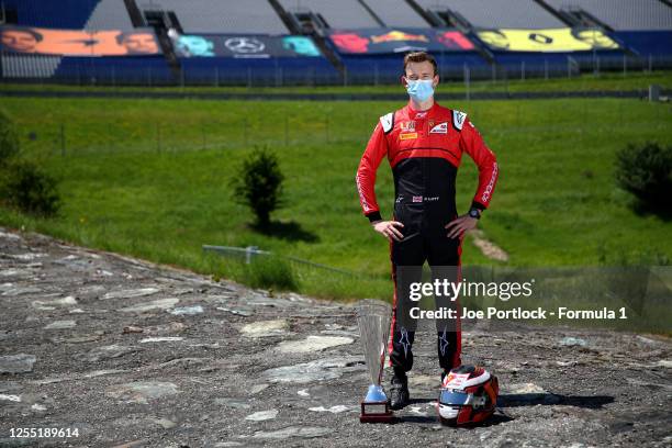 Winner of the round 1 feature race Callum Ilott of Great Britain and UNI-Virtuosi Racing poses for a photo during previews for the Formula 2...