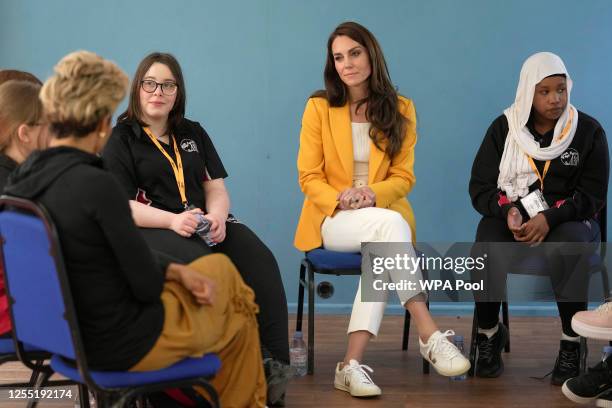 Catherine, Princess of Wales meets with some of the young people that the charity supports as she visits the Dame Kelly Holmes Trust on May 16, 2023...