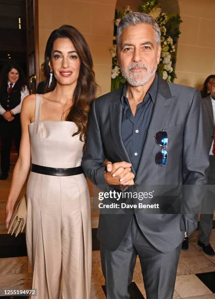 Amal Clooney and George Clooney attend The Prince's Trust and TKMaxx & Homesense Awards 2023 at the Theatre Royal Drury Lane on May 16, 2023 in...