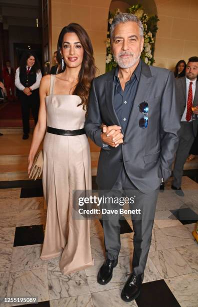 Amal Clooney and George Clooney attend The Prince's Trust and TKMaxx & Homesense Awards 2023 at the Theatre Royal Drury Lane on May 16, 2023 in...