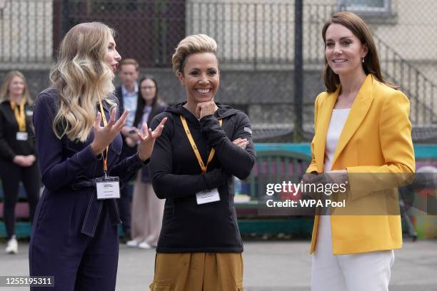 Catherine, Princess of Wales meets with Dame Kelly Holmes some of the young people that the charity supports as she visits the Dame Kelly Holmes...