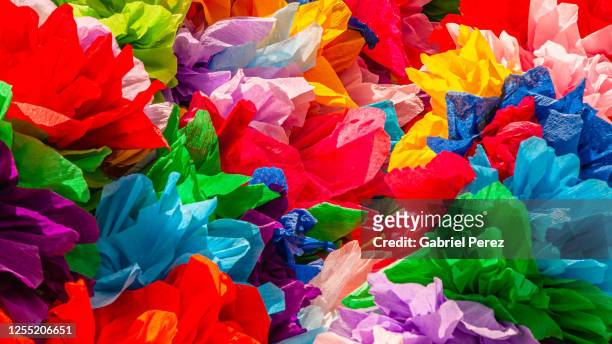 colorful mexican tissue paper flowers - entertainment art and culture stock-fotos und bilder