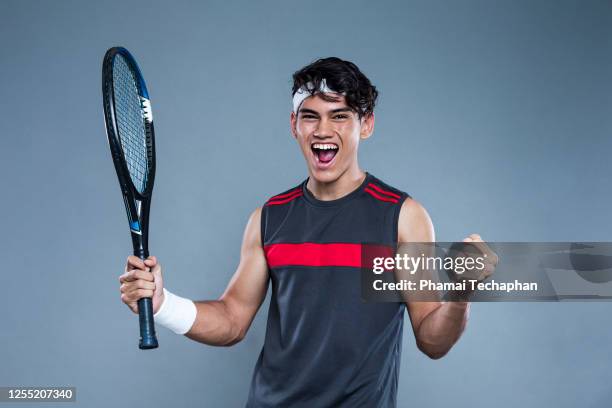 male tennis player celebration - young tennis player stock pictures, royalty-free photos & images