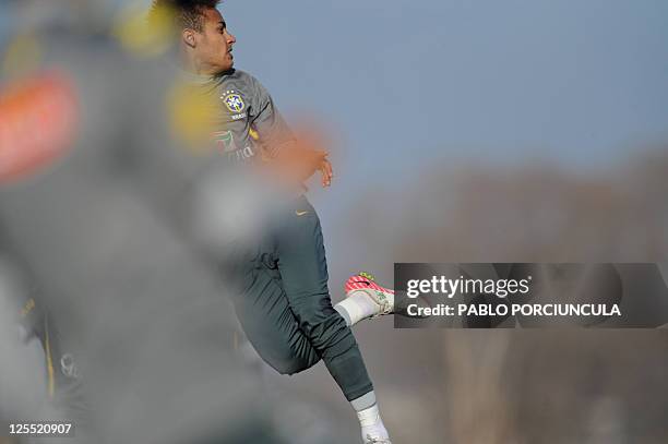 Brazilian national team footballer Neymar heads the ball during a training session in Campana, Buenos Aires, Argentina during the 2011 Argentina Copa...