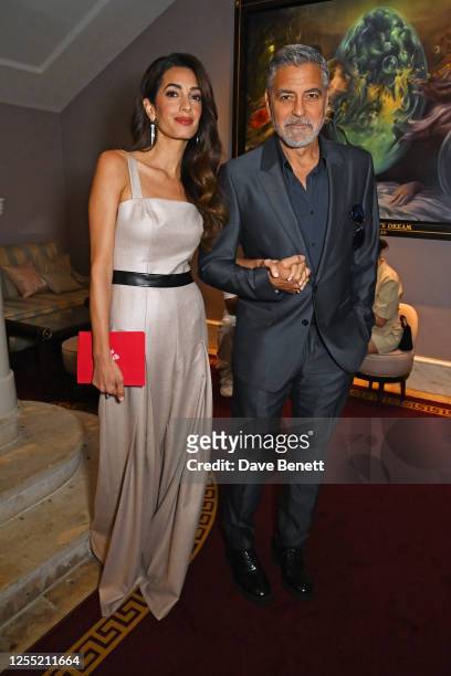 Amal Clooney and George Clooney attend The Prince's Trust and TKMaxx & Homesense Awards 2023 at the Theatre Royal Drury Lane on May 16, 2023 in...