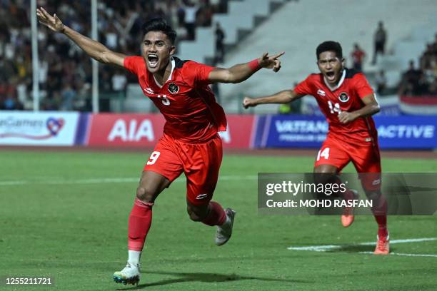 Indonesia's Muhammad Ramadhan Sananta celebrates after scoring during the men's football final match against Thailand at the 32nd Southeast Asian...